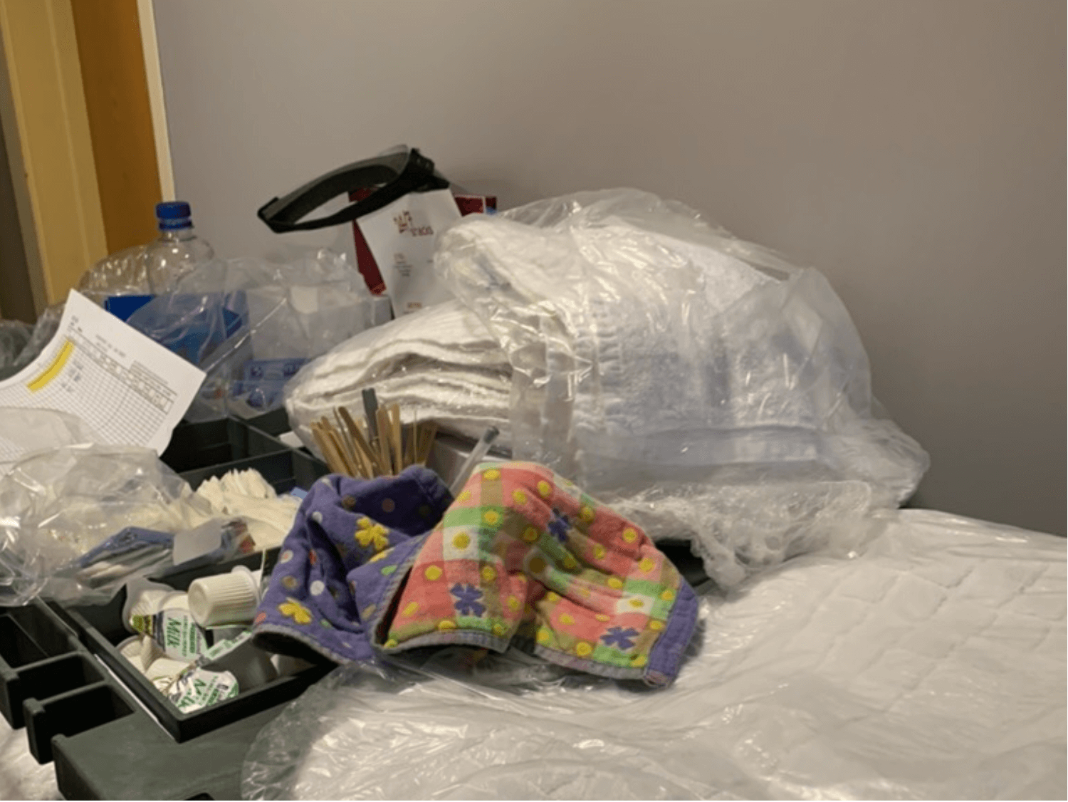 Housekeeping trolley showing cleaning materials and non-compliant cloth storage